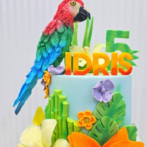 Alternative view of 2-Tier Parrot and Dinosaur Cake